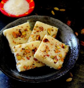 Coconut Barfi | 5 Best Dishes You Can Prepare for Raksha Bandhan | Credit: www.madhuseverydayindian.com