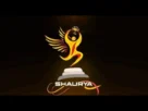 Logo of Shaurya: a stylized golden winged figure rising from a stepped pedestal, with the word 'SHAURYA' below.